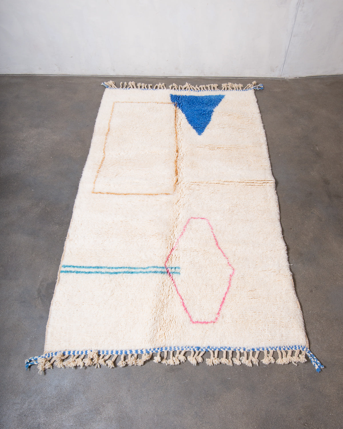 Modern, designer, handcrafted Berber rug from Morocco. Beniourain carpet with beautiful colours and patterns and fluffy wool texture.